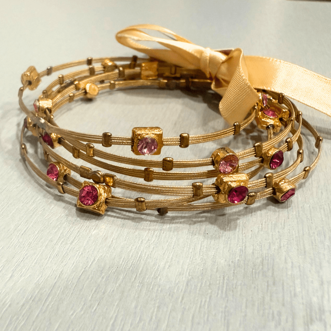 gold and pink bracelet